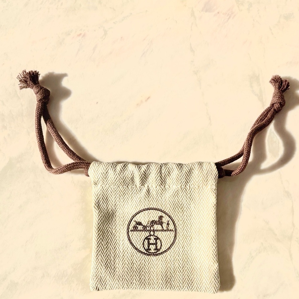 Beige Drawstring Pouch with Black Logo